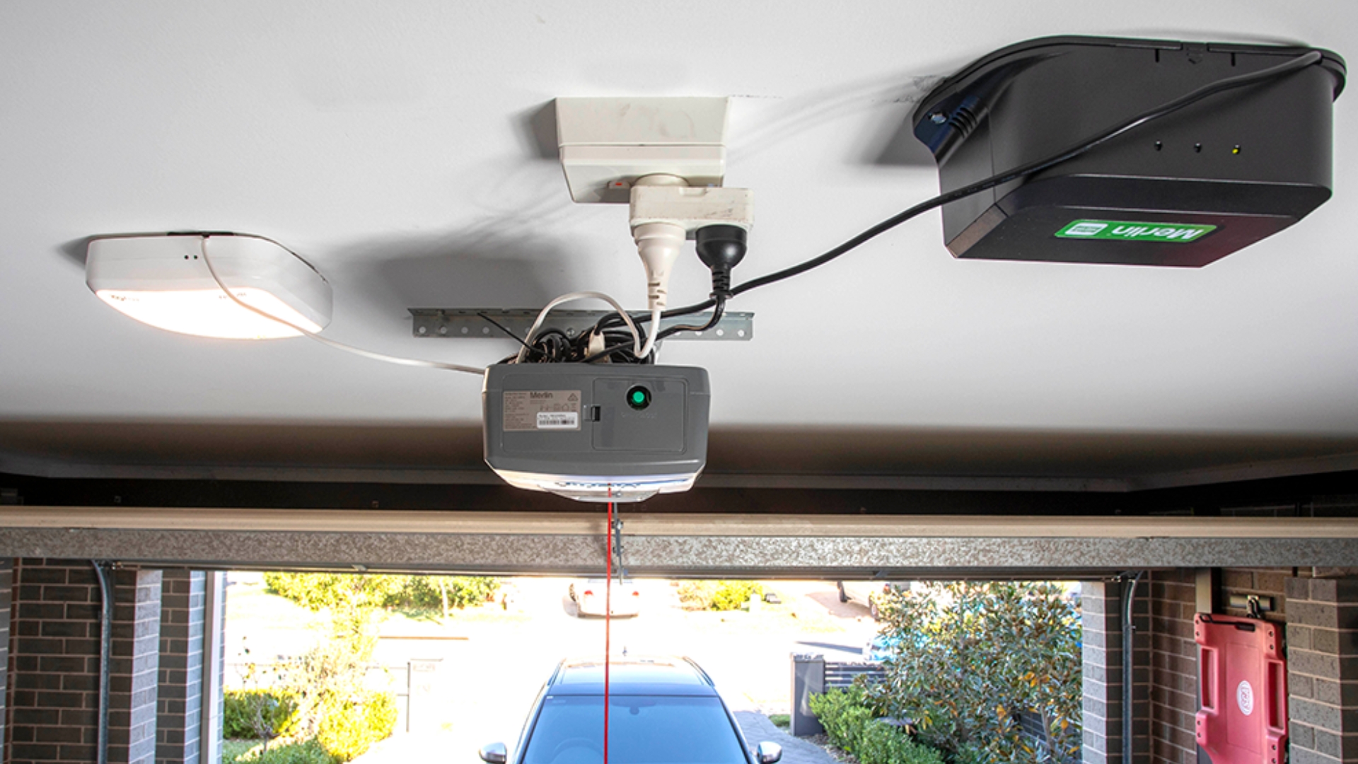 A garage door with an opener backup battery