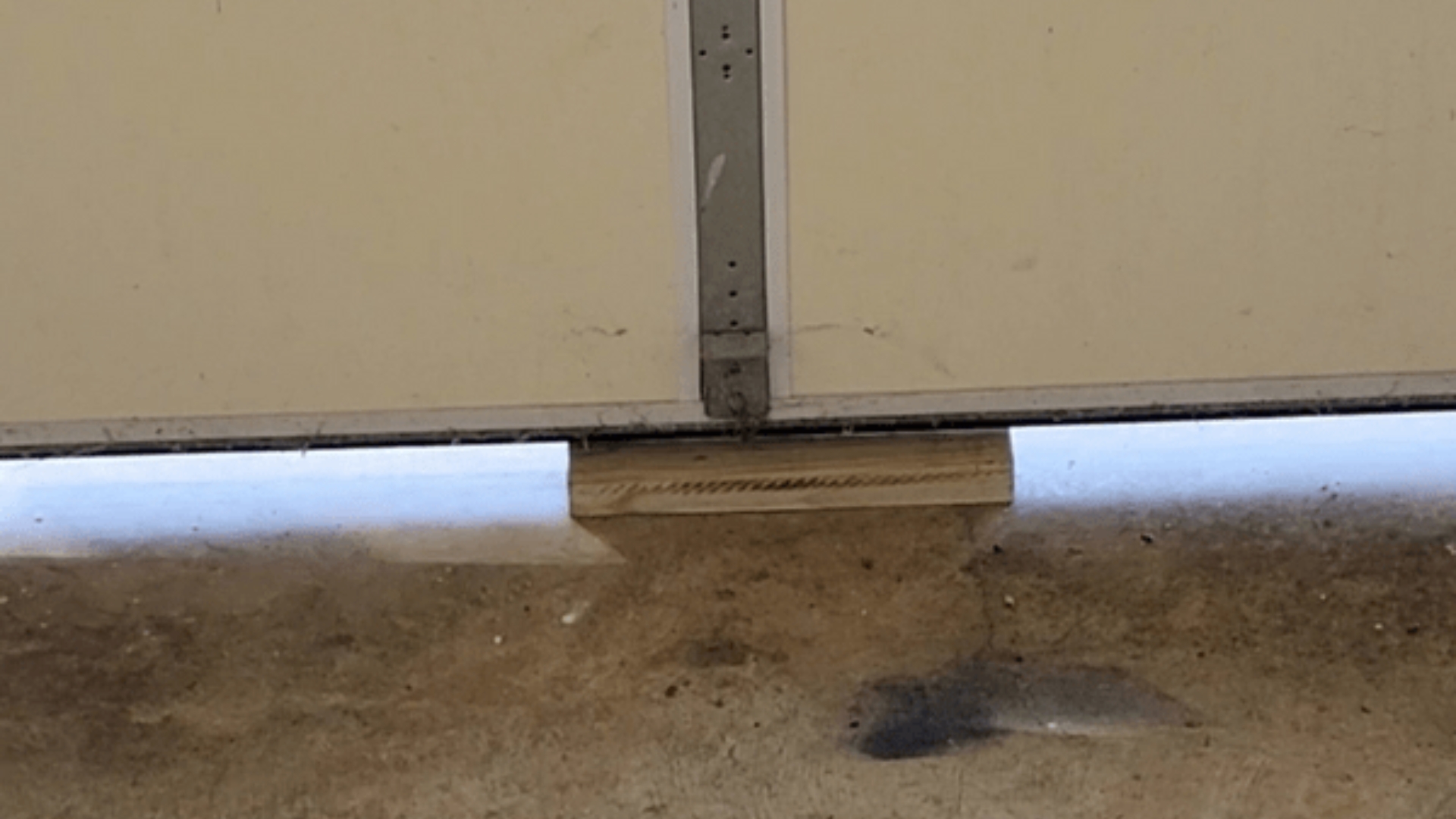 Testing for garage door safety using a wood block