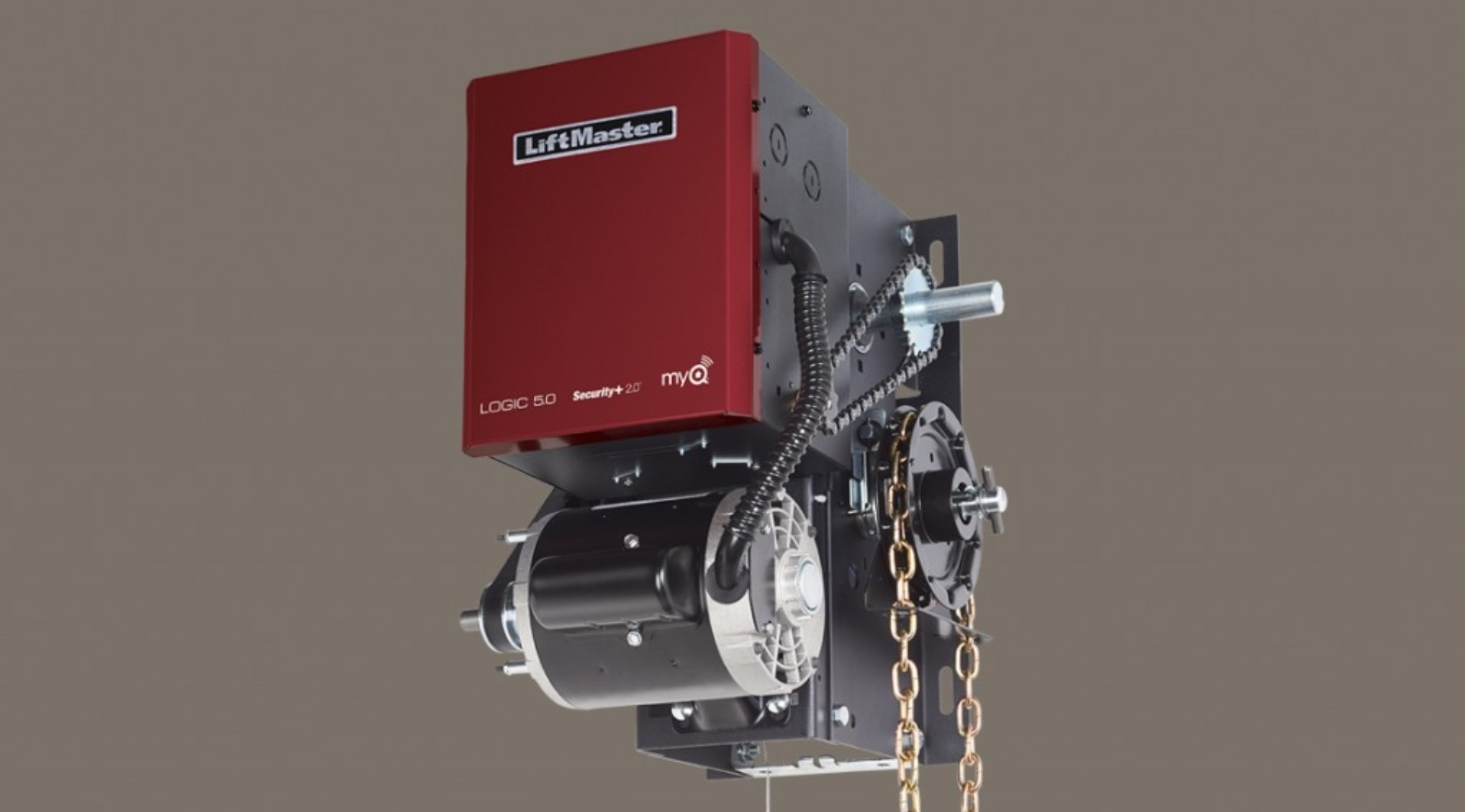 A jackshaft opener for commercial garage doors