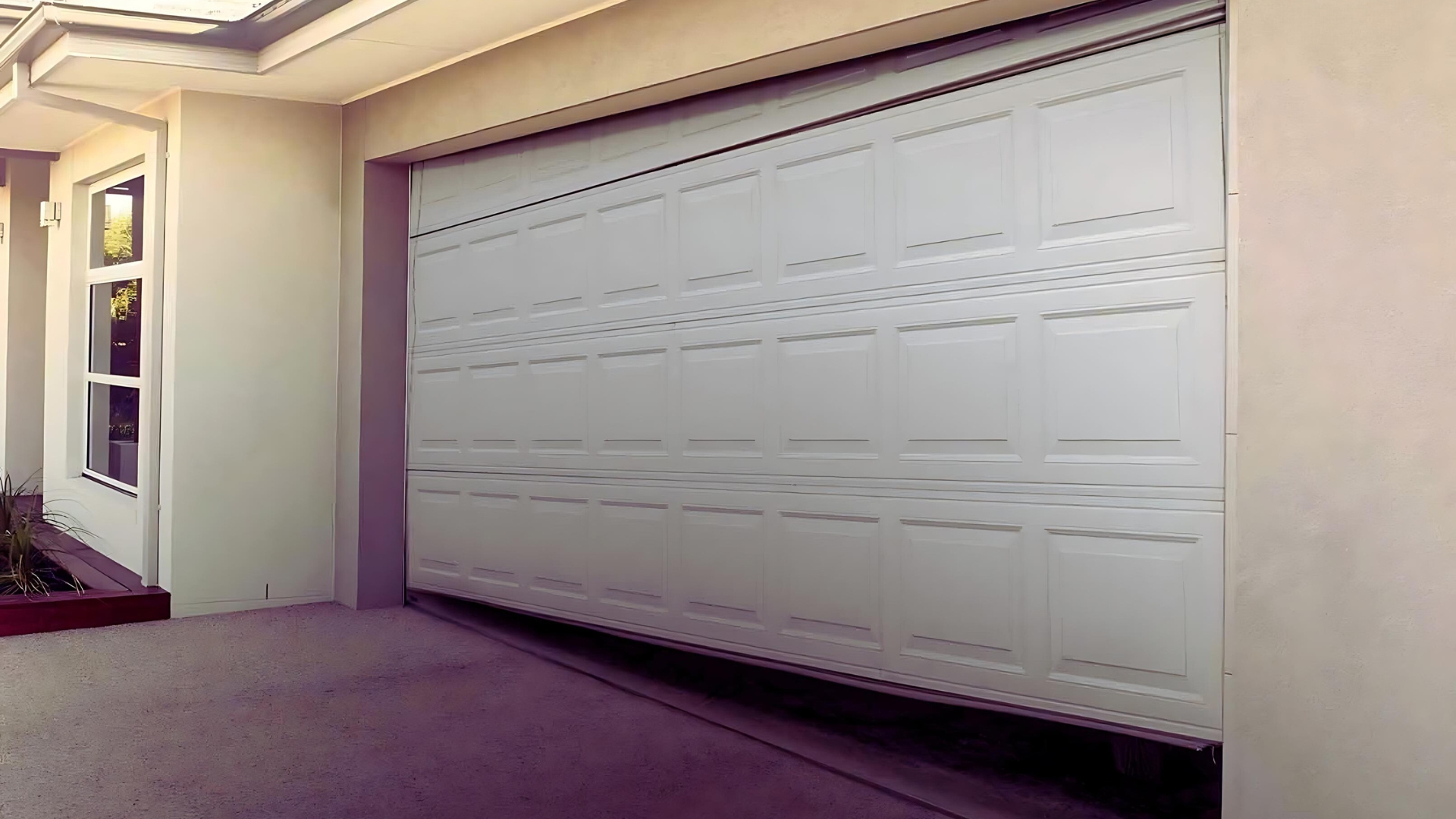 A residential garage door that is off-balanced