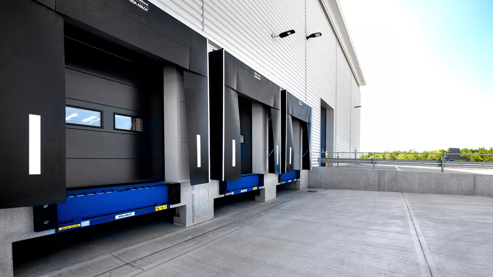 A warehouse with loading dock overhead doors installed for fast unloading of shipments