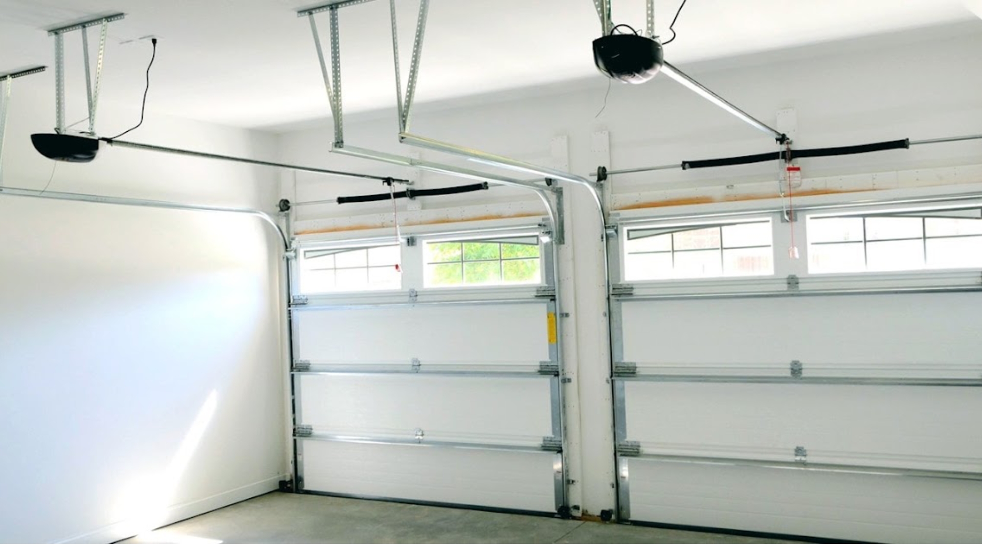 A double garage featuring high-grade door struts and support brackets.